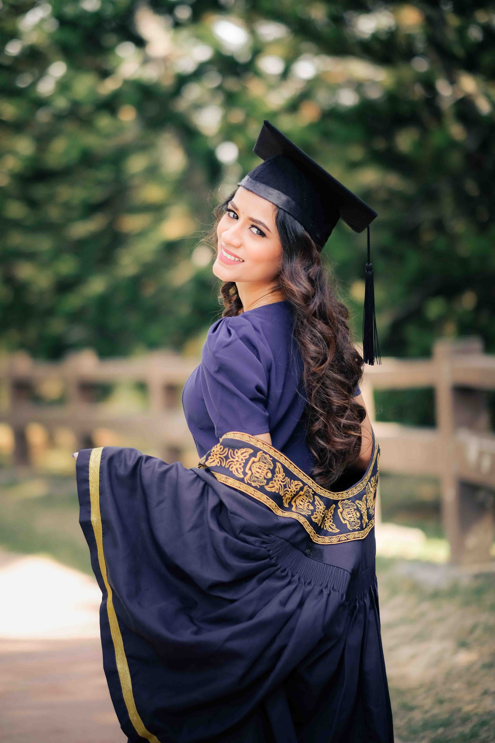 Suria and family outdoor graduation portrait in Taman Saujana Hijau, Putrajaya