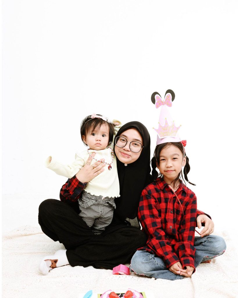 Mother and daughters floor portrait, first birthday photoshoot at The Cade & Co studio Cyberjaya