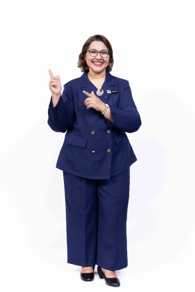 Confident studio portrait in navy suit at Bahagian Pendidikan Swasta, Ministry of Education Putrajaya, corporate onsite photography by The Cade & Co