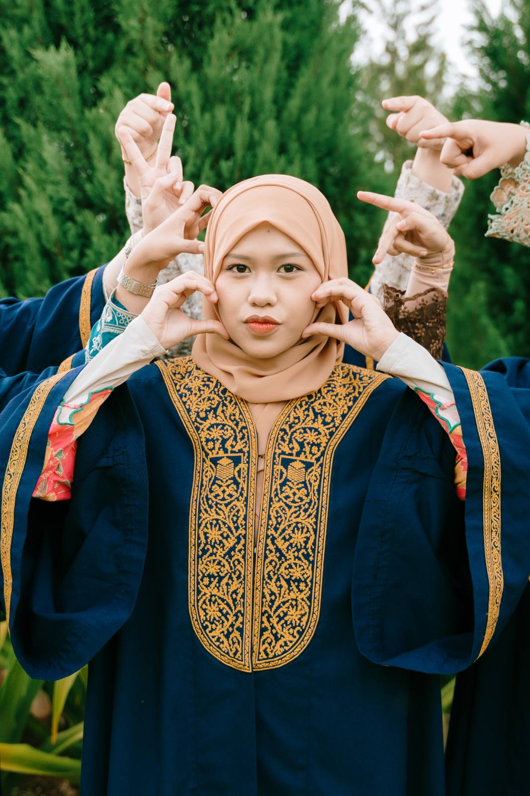 Syarifa and BFF UITM outdoor graduation at Taman Saujana Hijau, Putrajaya